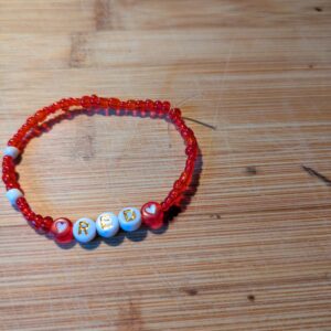 Red & White Seed Bead Bracelet with Letters